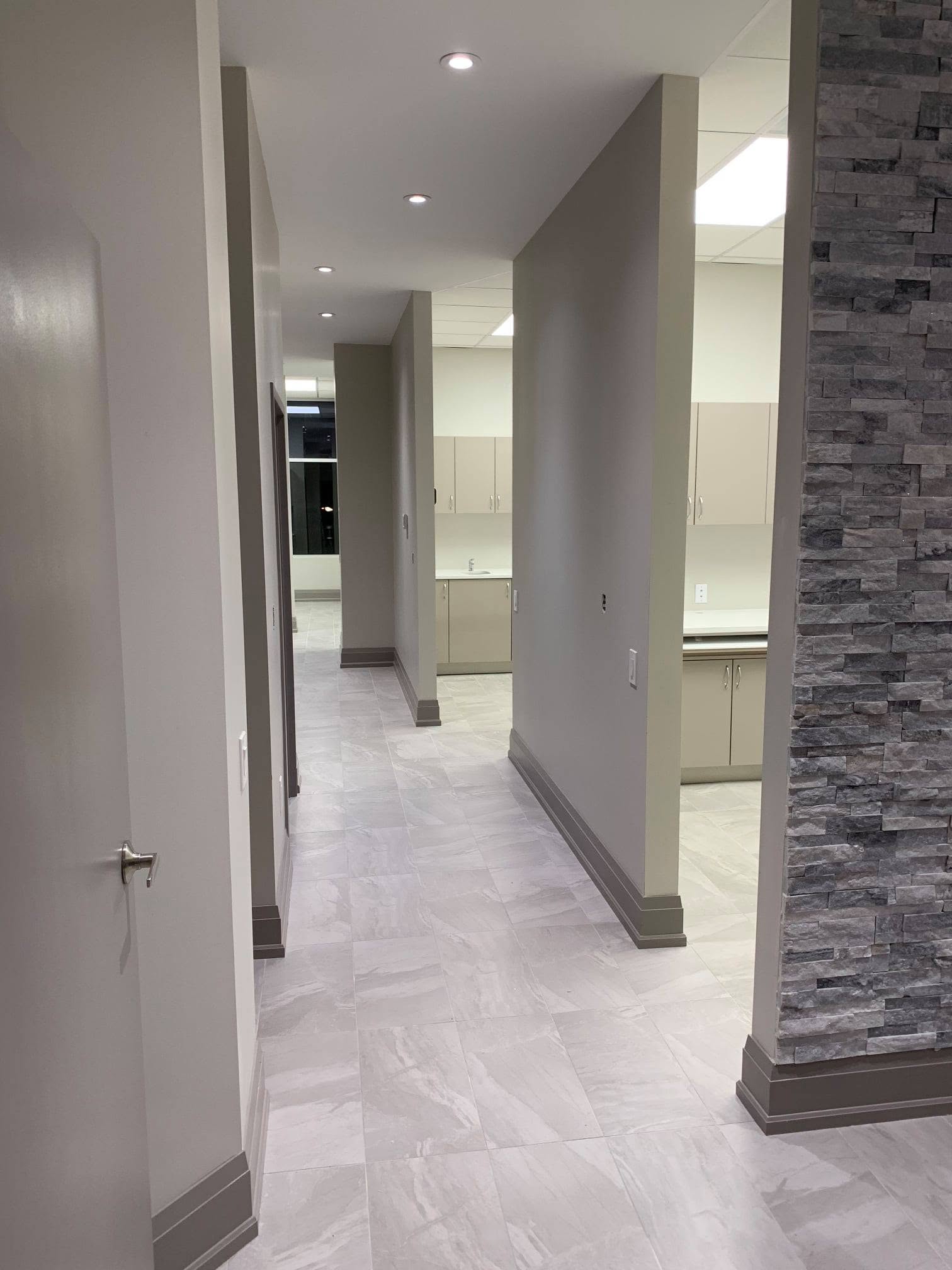 Finished corridor connecting dental treatment rooms